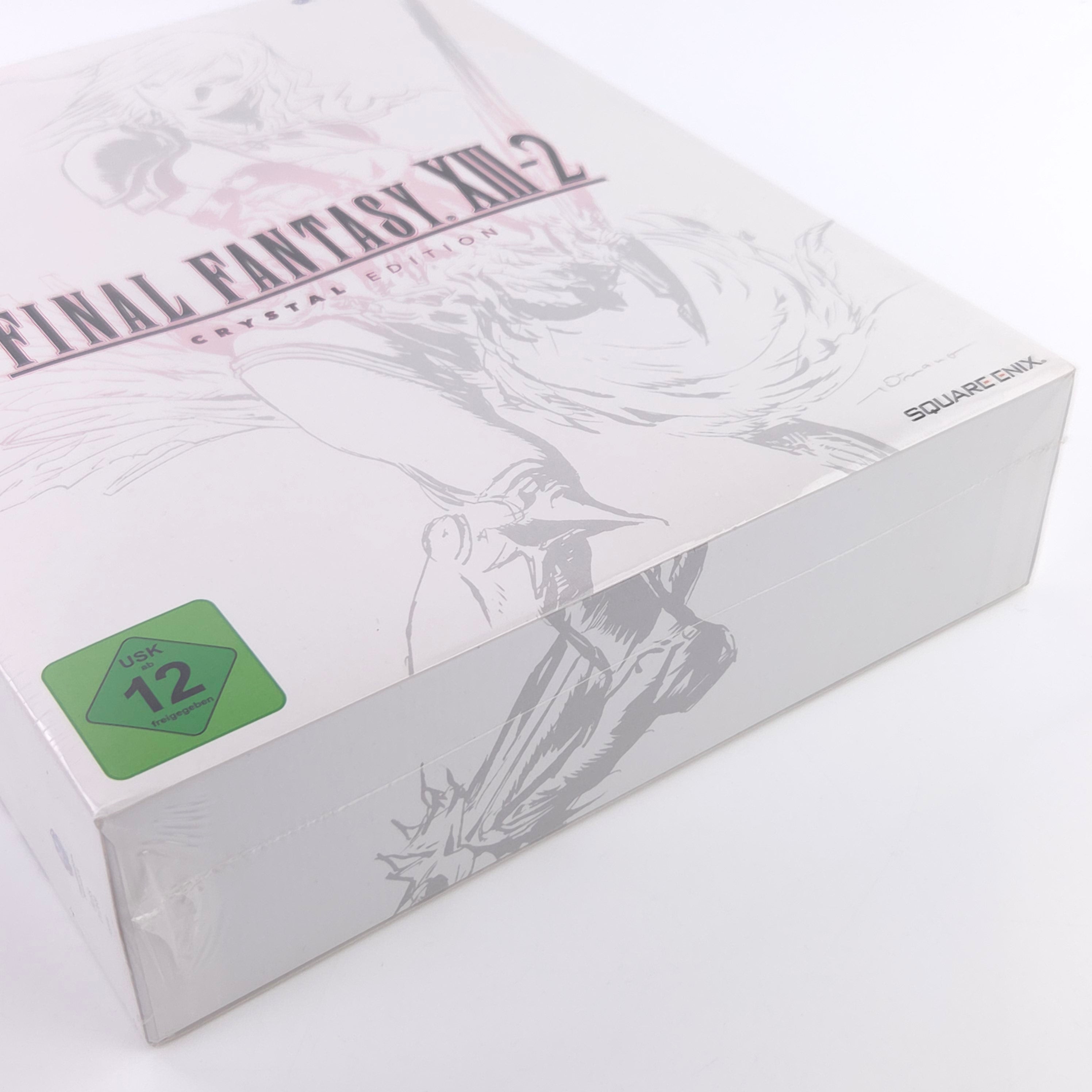 Final Fantasy X-2 Box weiß mit Silber-Design und grüner Bewertung