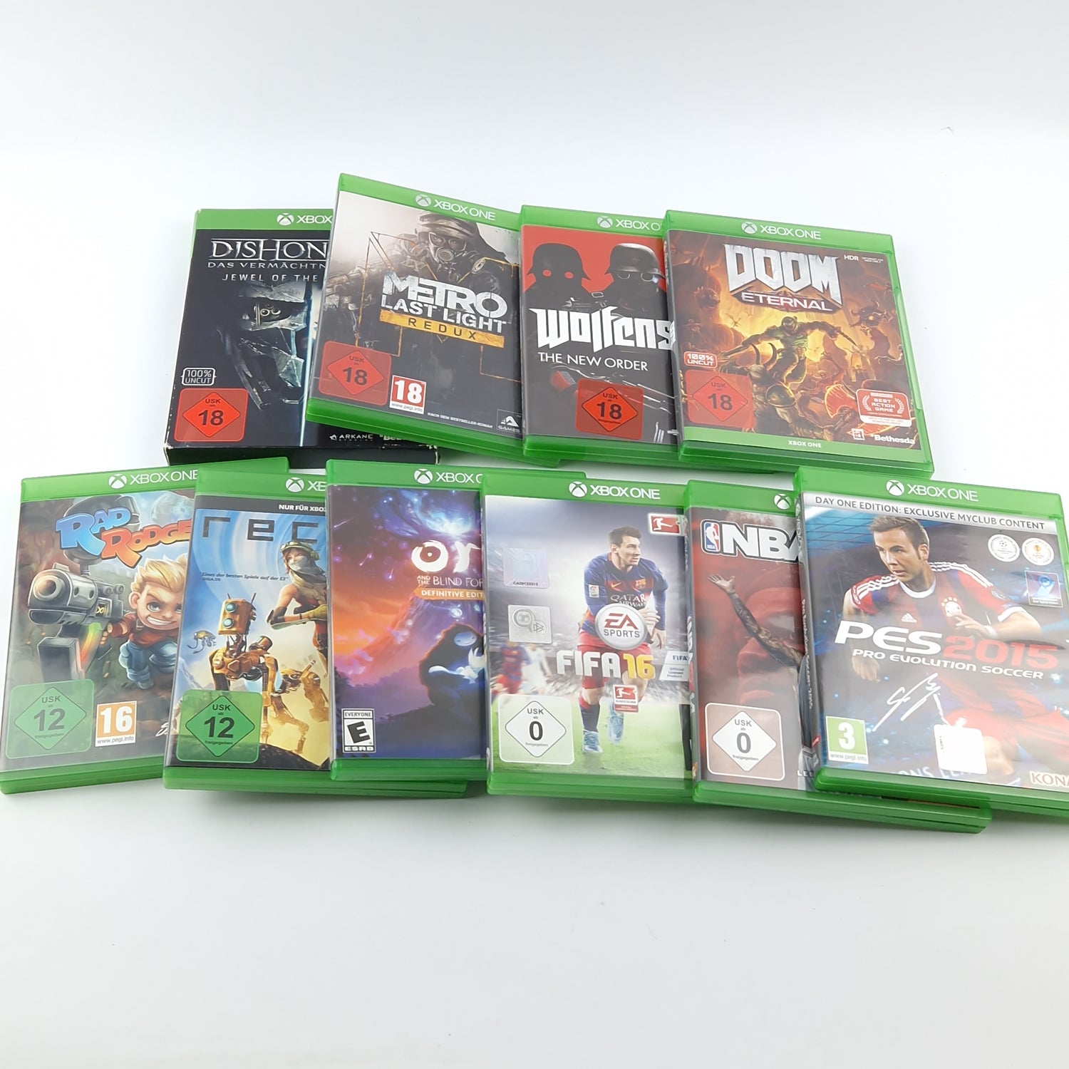 Xbox One X Konsole mit Controller, Kabel und 10 Spielen