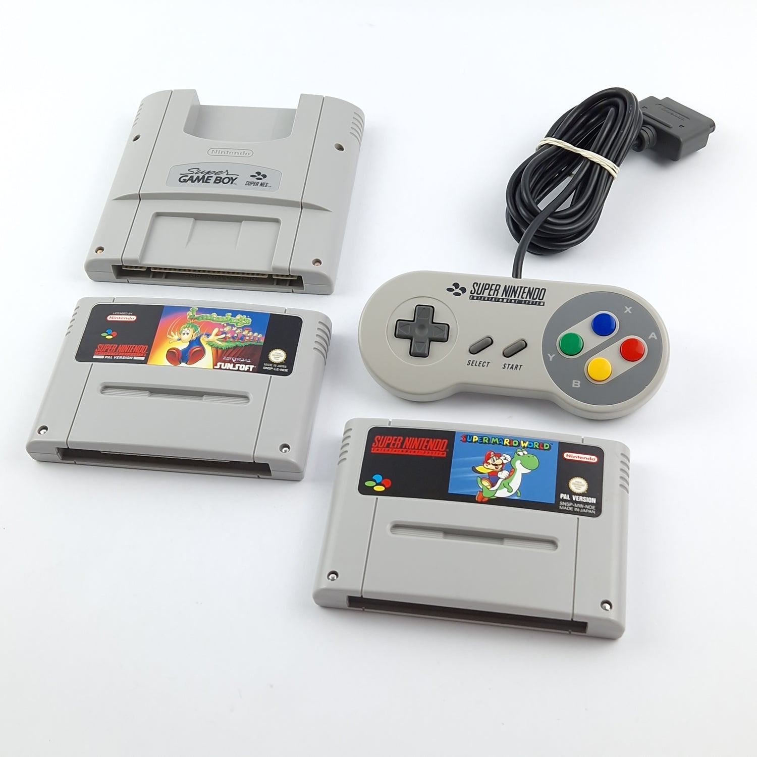 Super Nintendo console with 2 games, Gameboy adapter, controller. & Cable