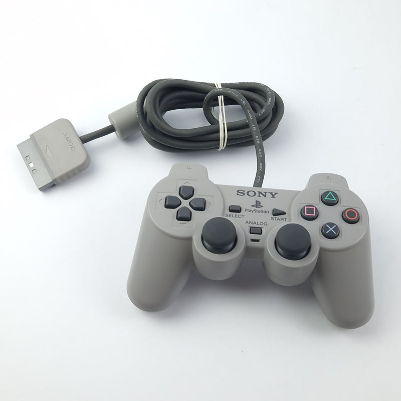 Playstation 1 console: with Namco gun, dual shock controller and cable - PS1