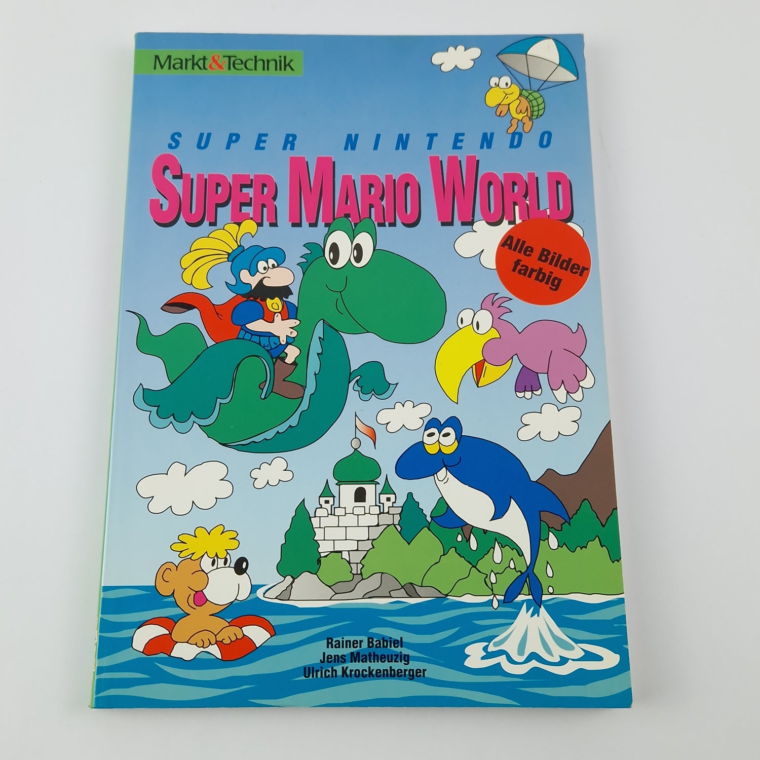 Market & Technology Game Advisor: Super Mario World - Solution Book SNES Book German.