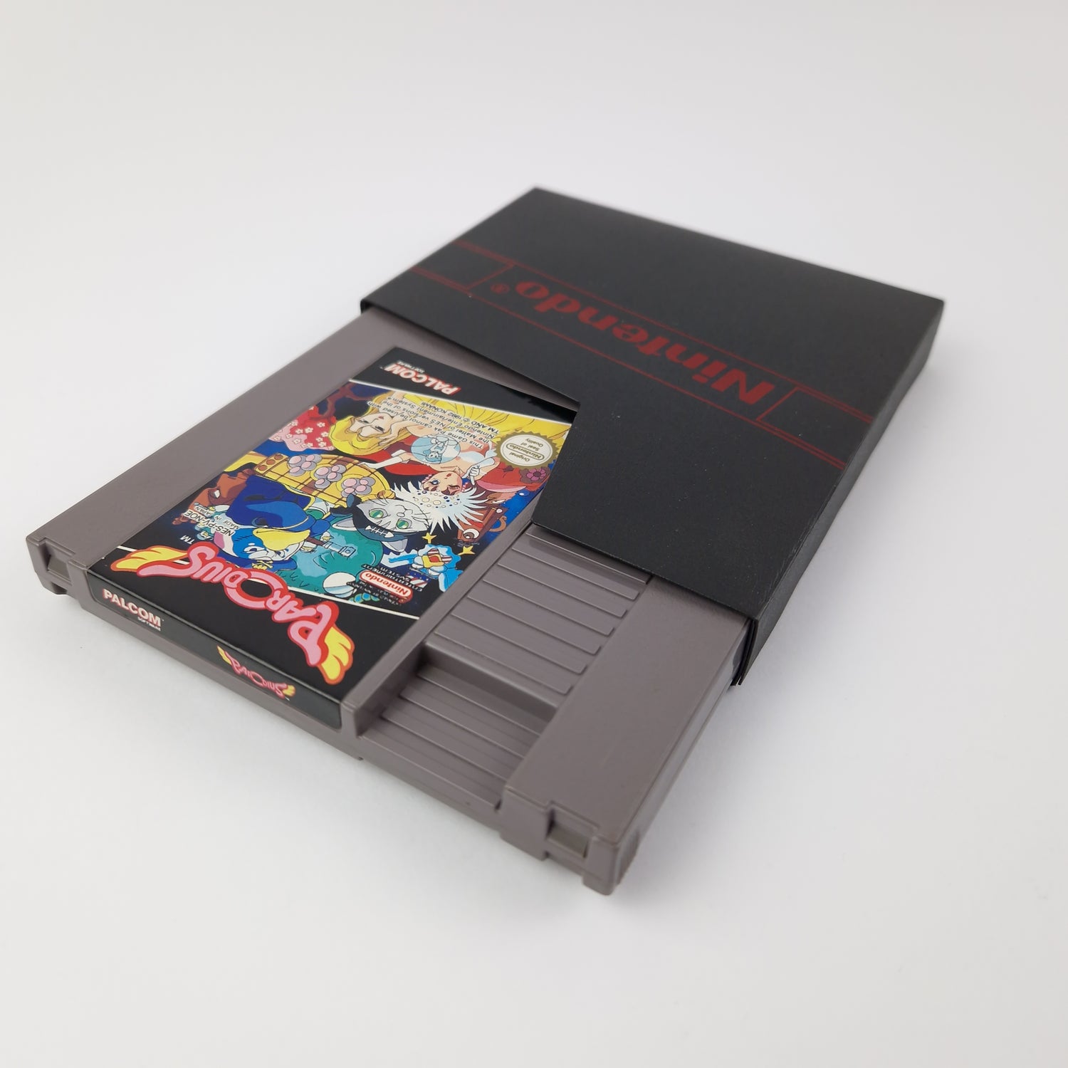 Nintendo NES game: Parodius - PAL-B module cartridge + slipcase PALCOM
