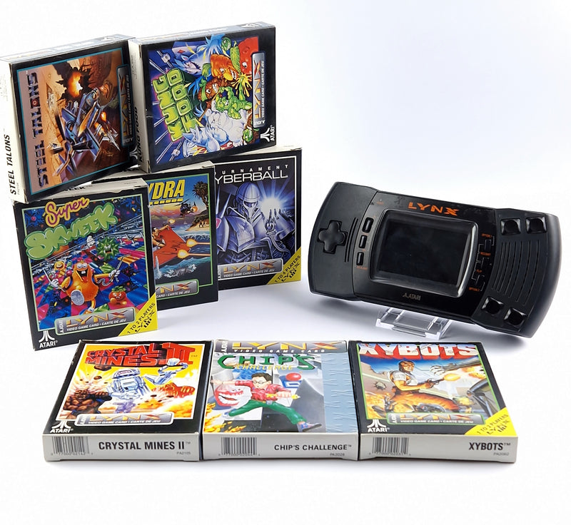 Atari Lynx console with 8 games in original packaging - partial defect bundle