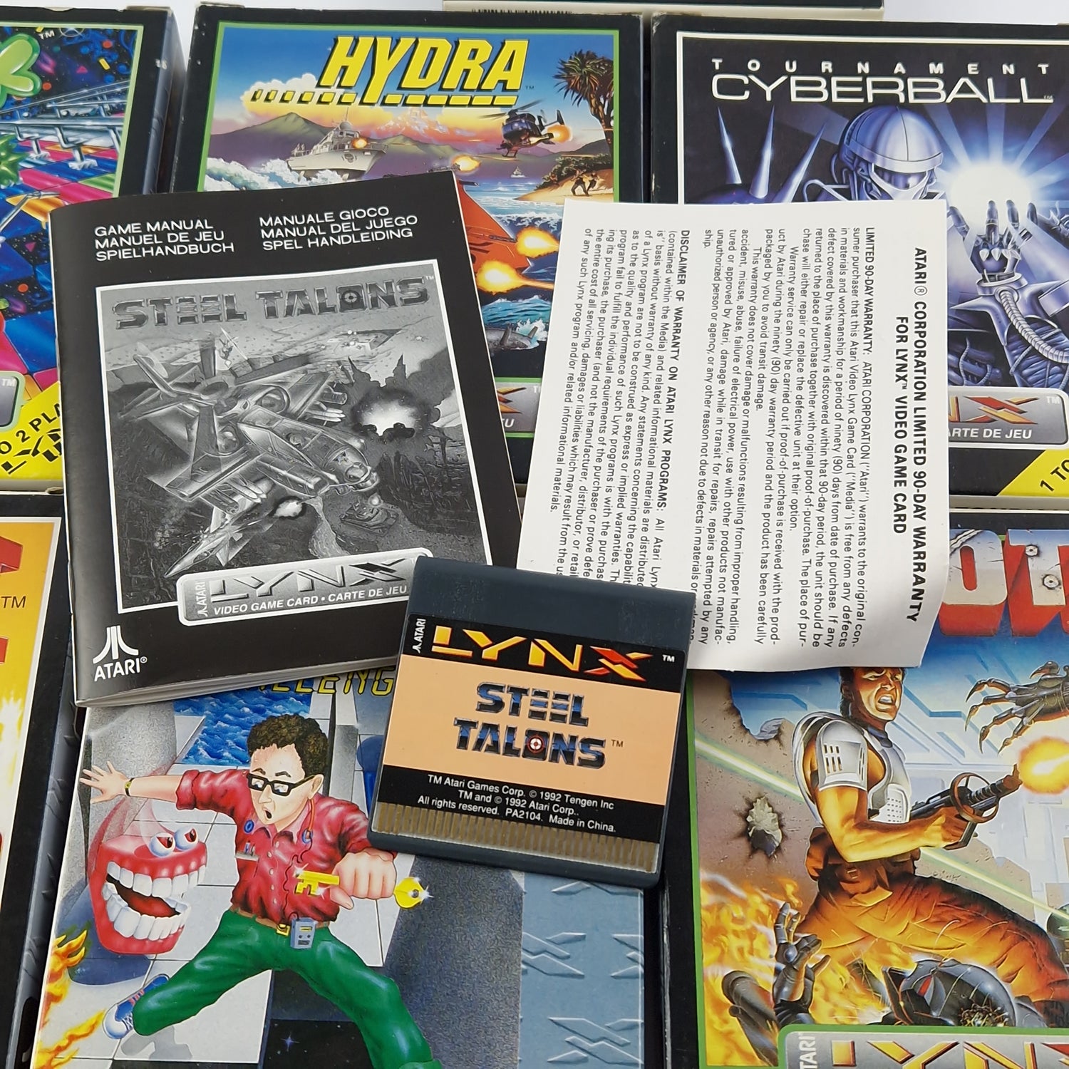 Atari Lynx console with 8 games in original packaging - partial defect bundle