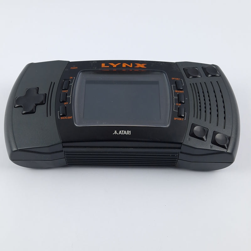 Atari Lynx console with 8 games in original packaging - partial defect bundle