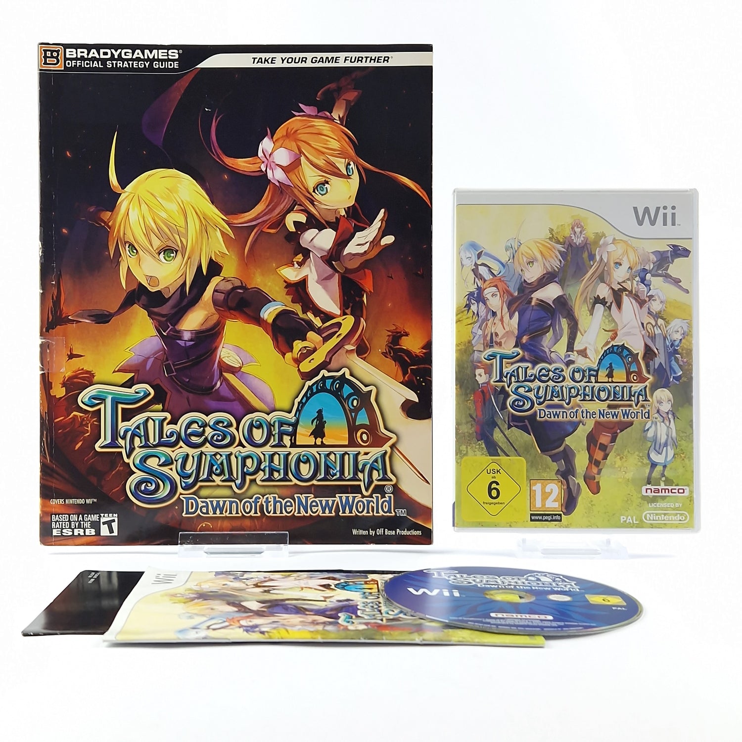 Nintendo Wii game: Tales of Symphonia Dawn of the World + Bradygames Guide OVP