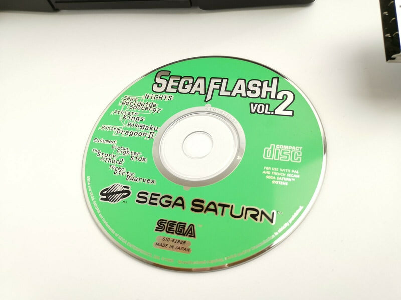 Sega Saturn console bundle with control pad, connection cables and Segaflash Vol 2