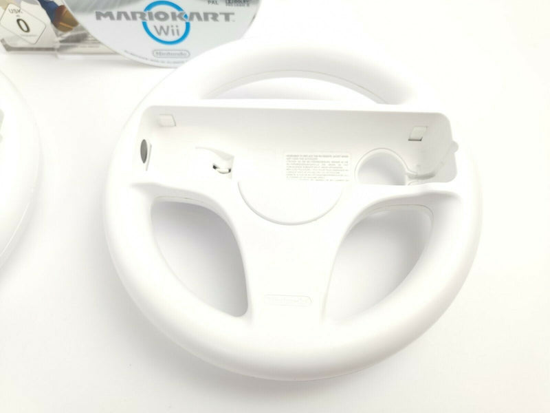 Nintendo Wii game "Mario Kart Wii + 2 steering wheels" Pal |