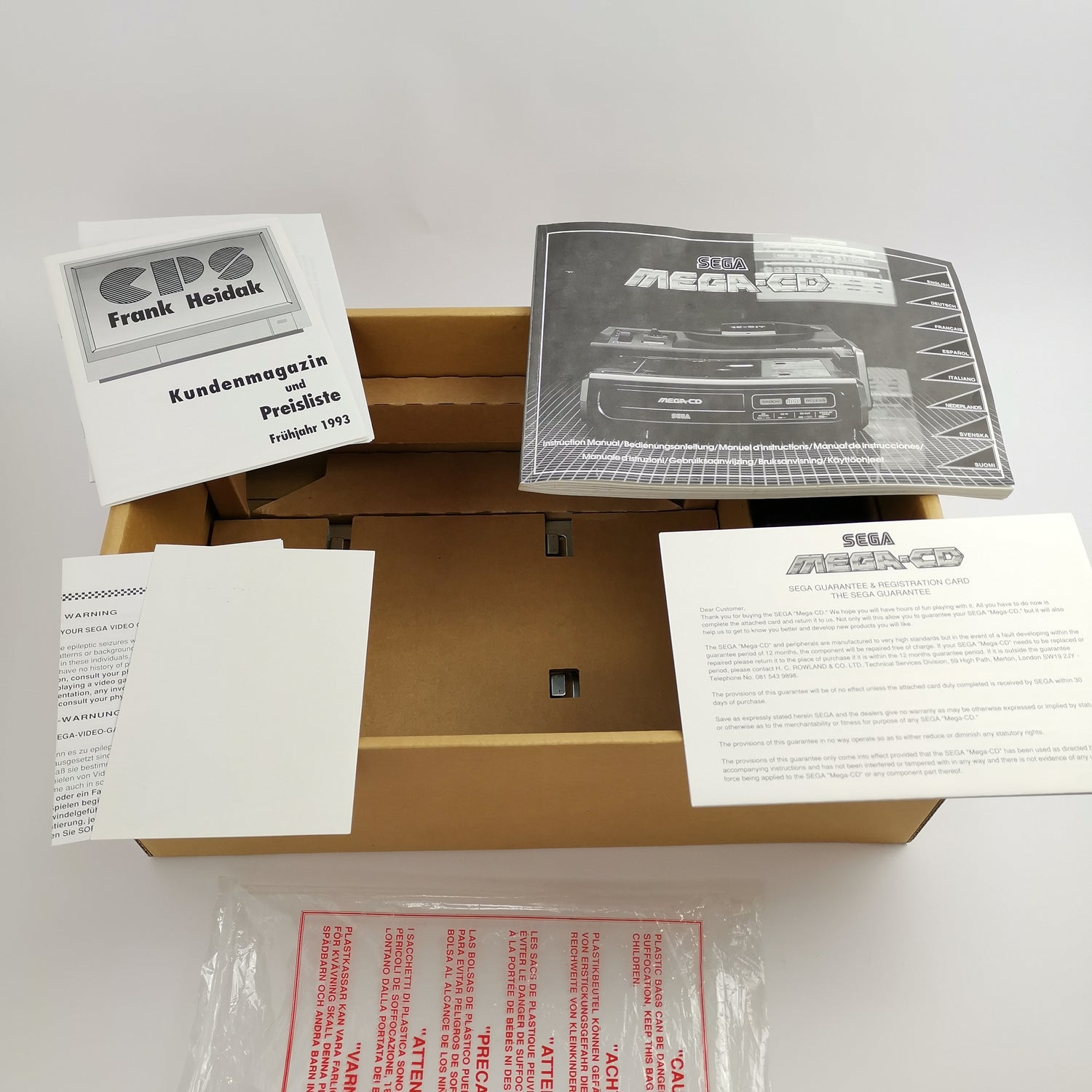 Sega Mega CD console in original packaging | PAL Console - Mega CD Adapter for Mega Drive