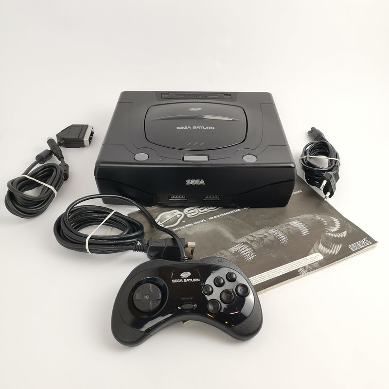 Sega Saturn console with 1 controller, cable, bootleg sampler and instructions | PAL