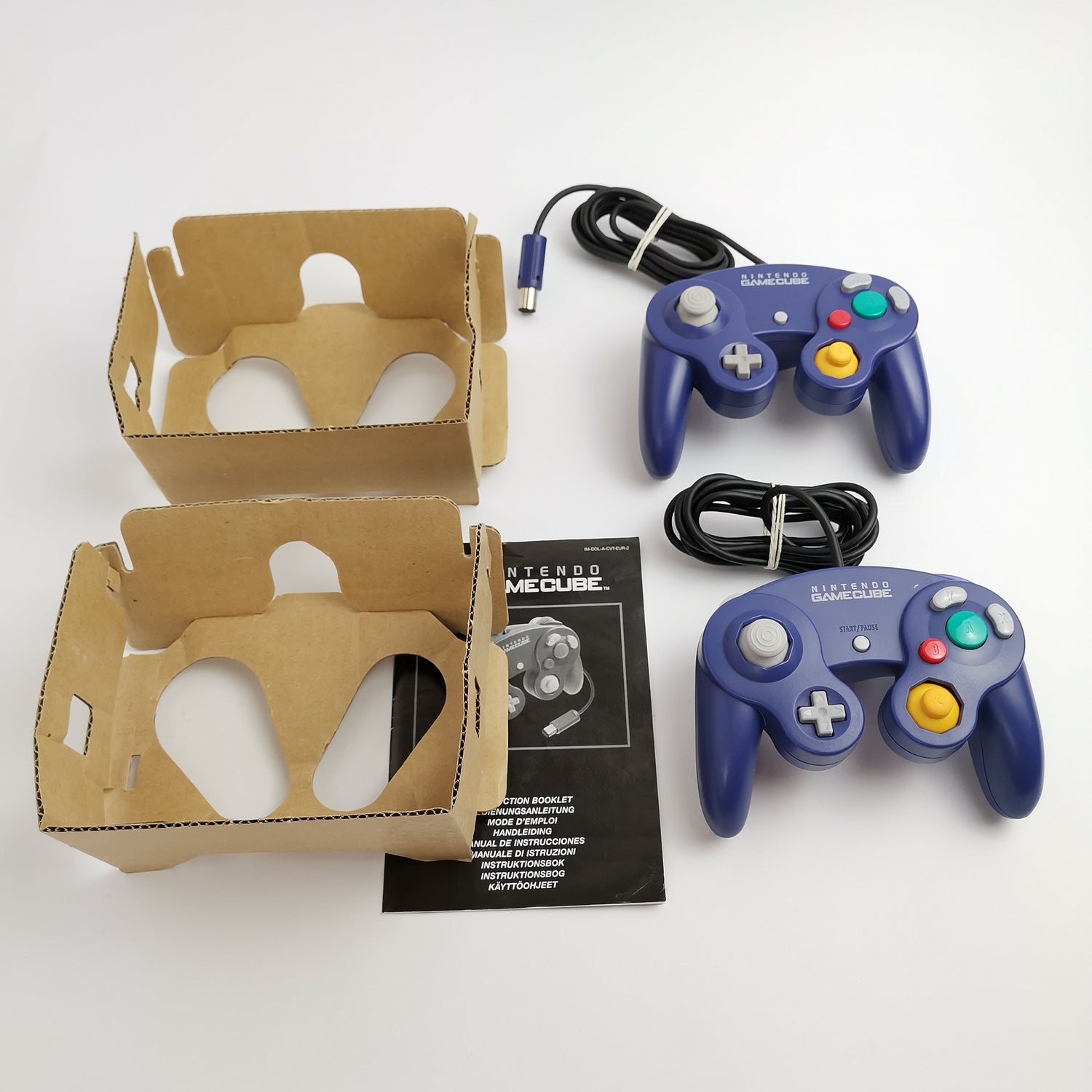2x original Nintendo Gamecube controllers in original packaging: purple / purple - gamepad