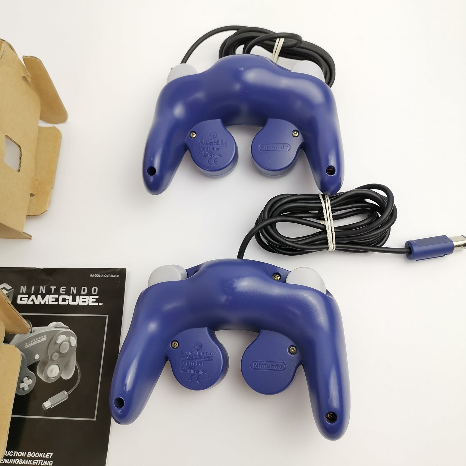 2x original Nintendo Gamecube controllers in original packaging: purple / purple - gamepad