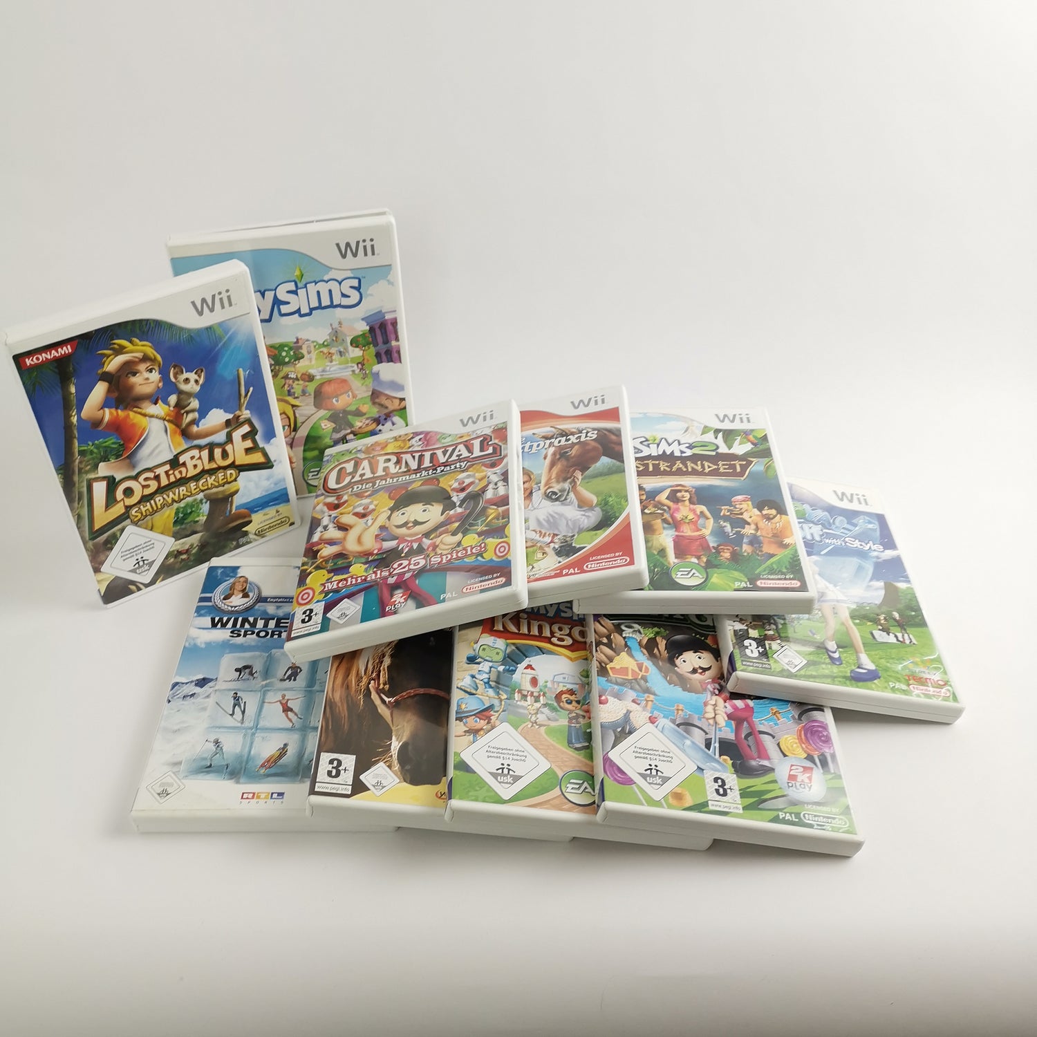 Nintendo Wii Konsolen Bundle mit allen Anschlusskabeln, Controller & 10 Spielen