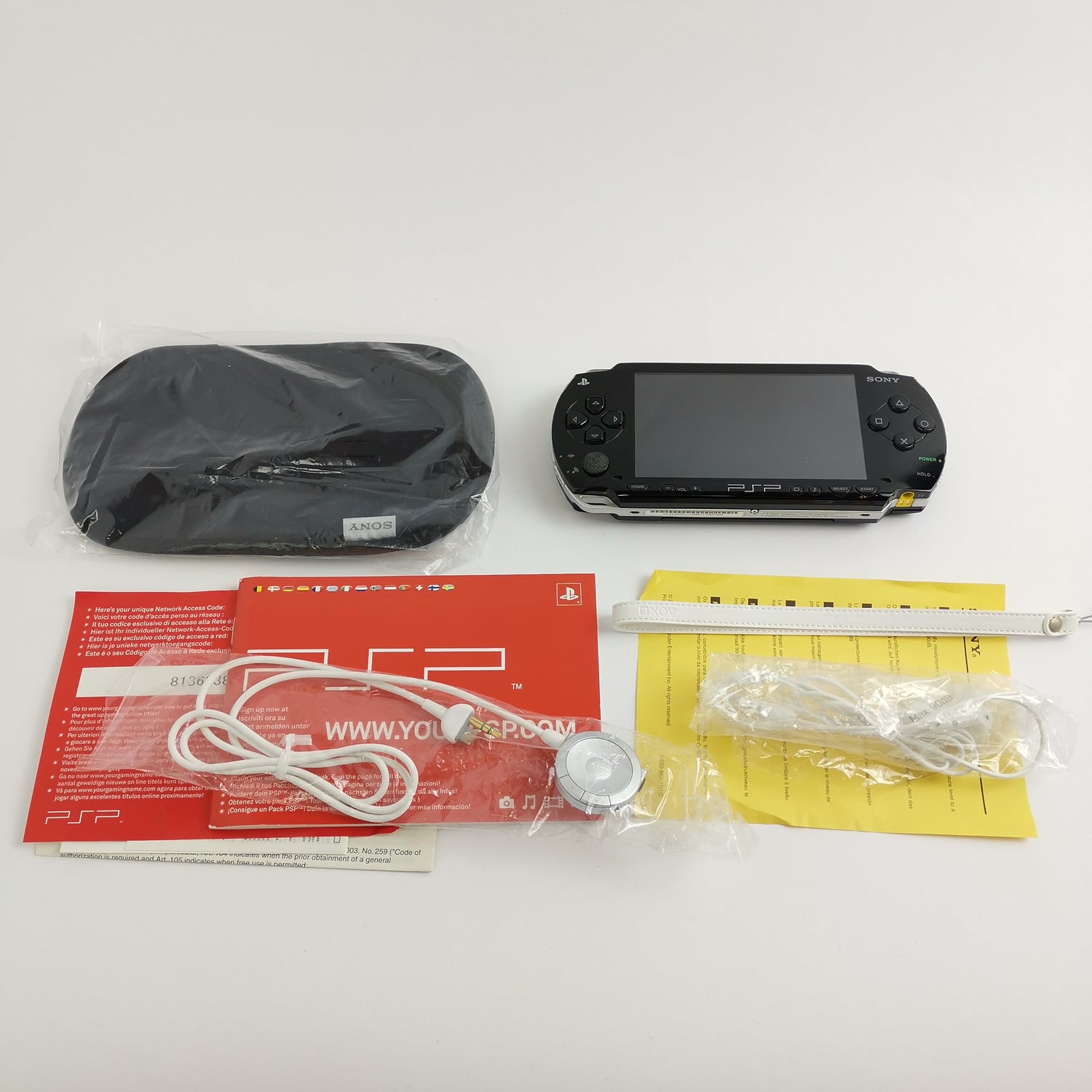 Sony Playstation Portable Console: Value Pack in original packaging with 4 games - DEFECTIVE [1]
