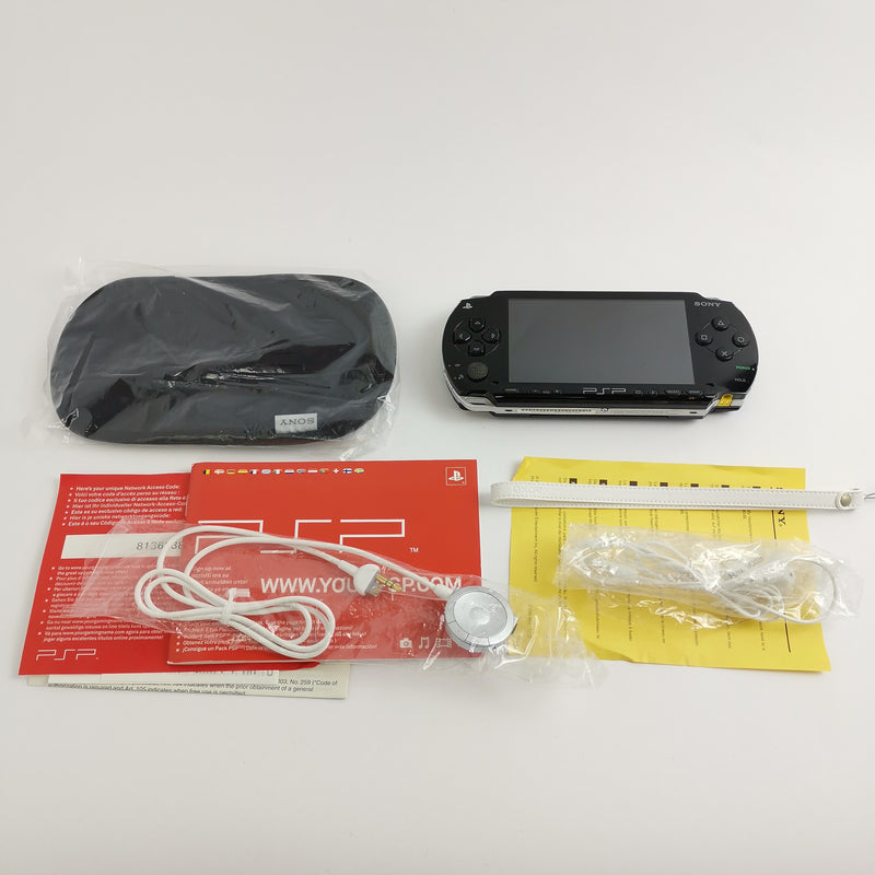 Sony Playstation Portable Console: Value Pack in original packaging with 4 games - DEFECTIVE [1]