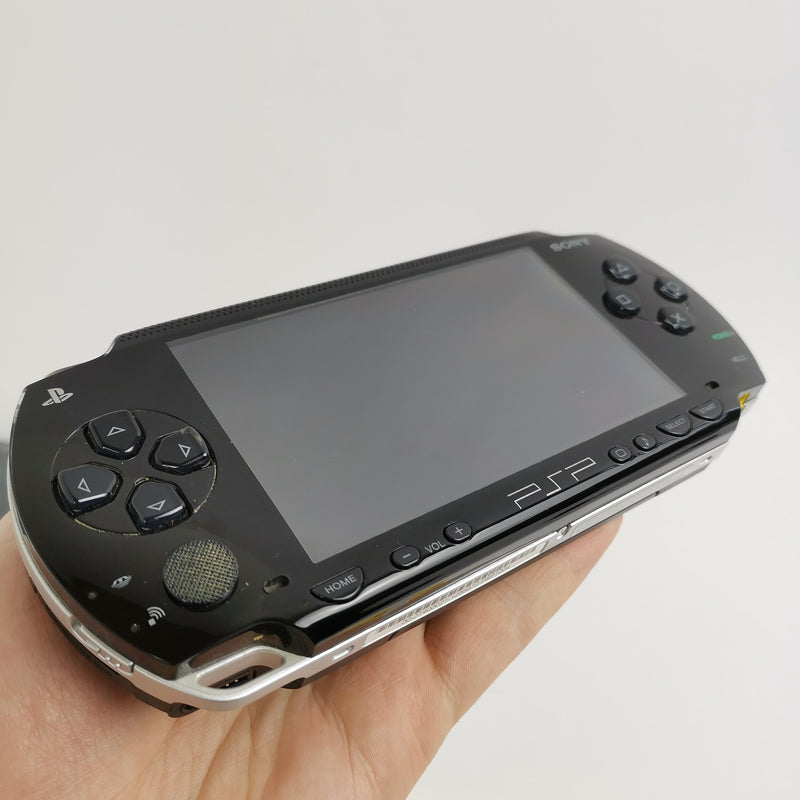 Sony Playstation Portable Console: Value Pack in original packaging with 4 games - DEFECTIVE [1]