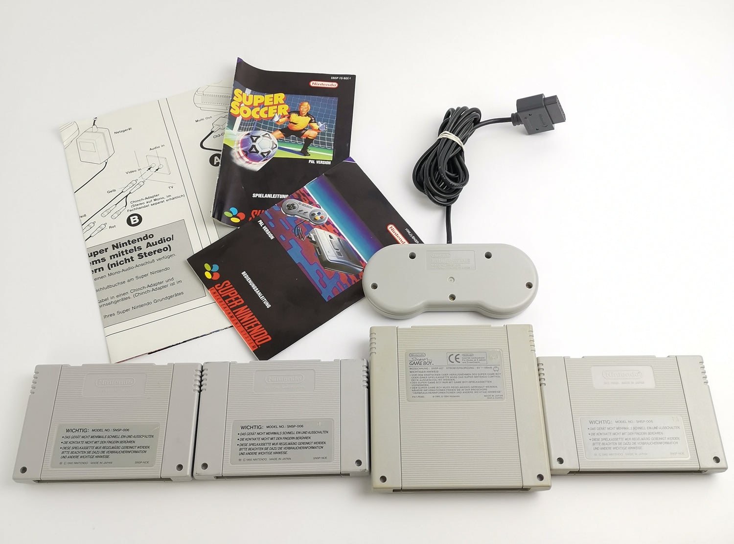 Super Nintendo Konsole : 1 Controller, 3 Spiele, Game Boy Adapter u. Kabel SNES