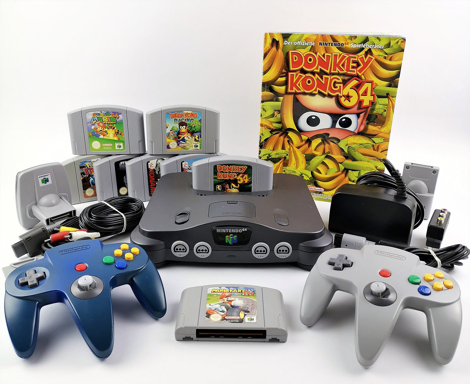 Nintendo 64 console: cable, 2 controllers, 8 games, expansion pack etc. N64