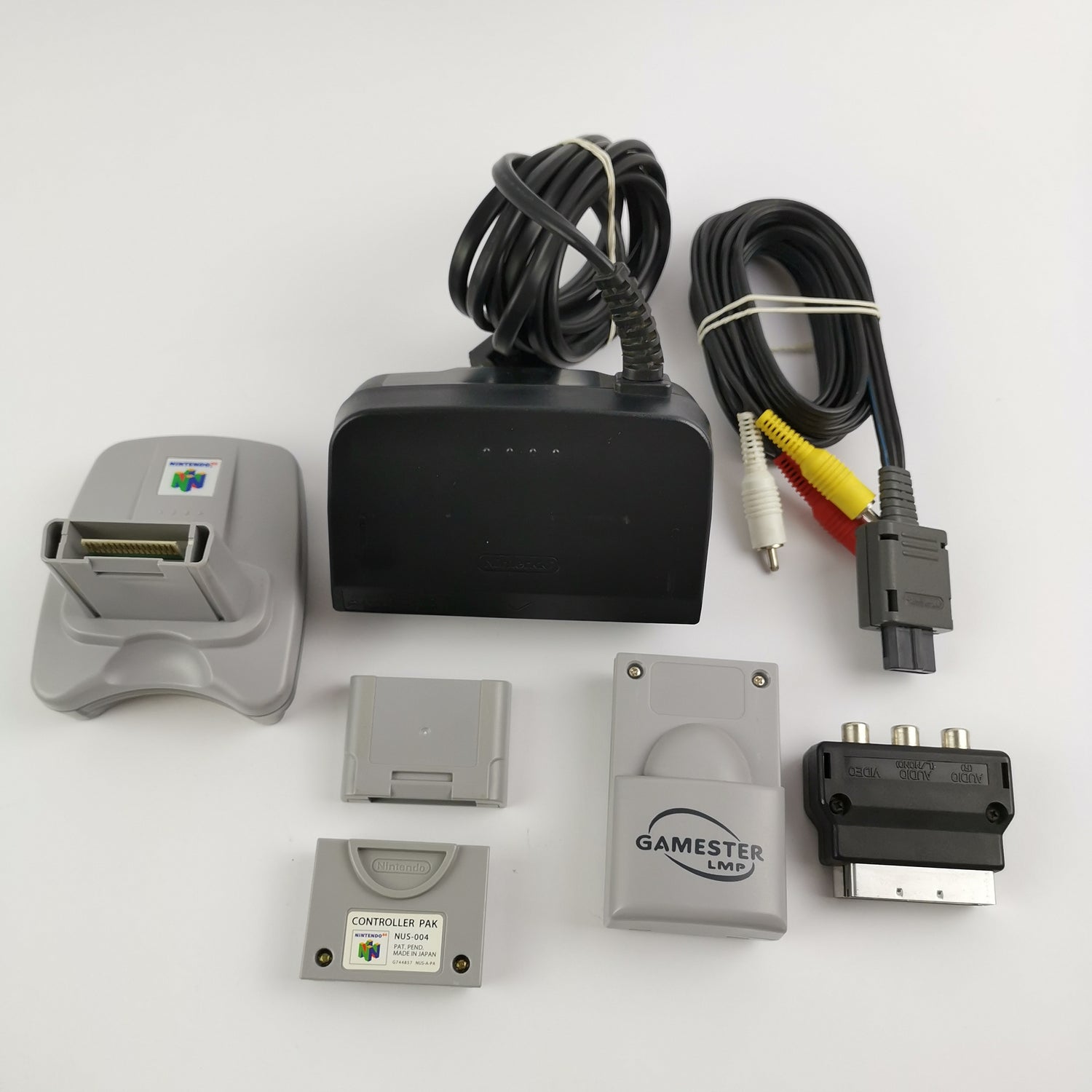Nintendo 64 console: cable, 2 controllers, 8 games, expansion pack etc. N64
