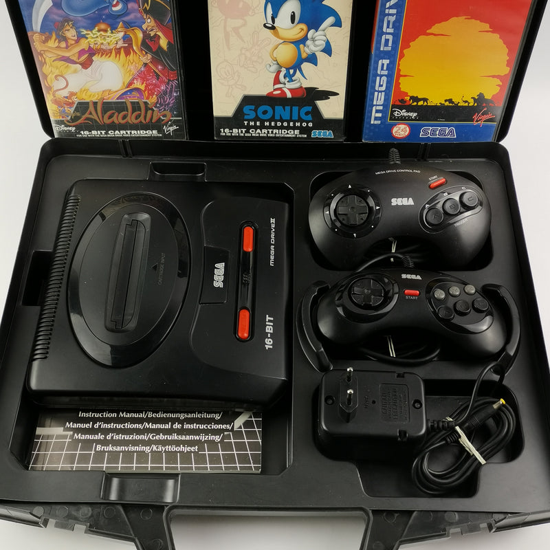 Sega Mega Drive II 2 with 2 controllers, power cable, 4 games and case