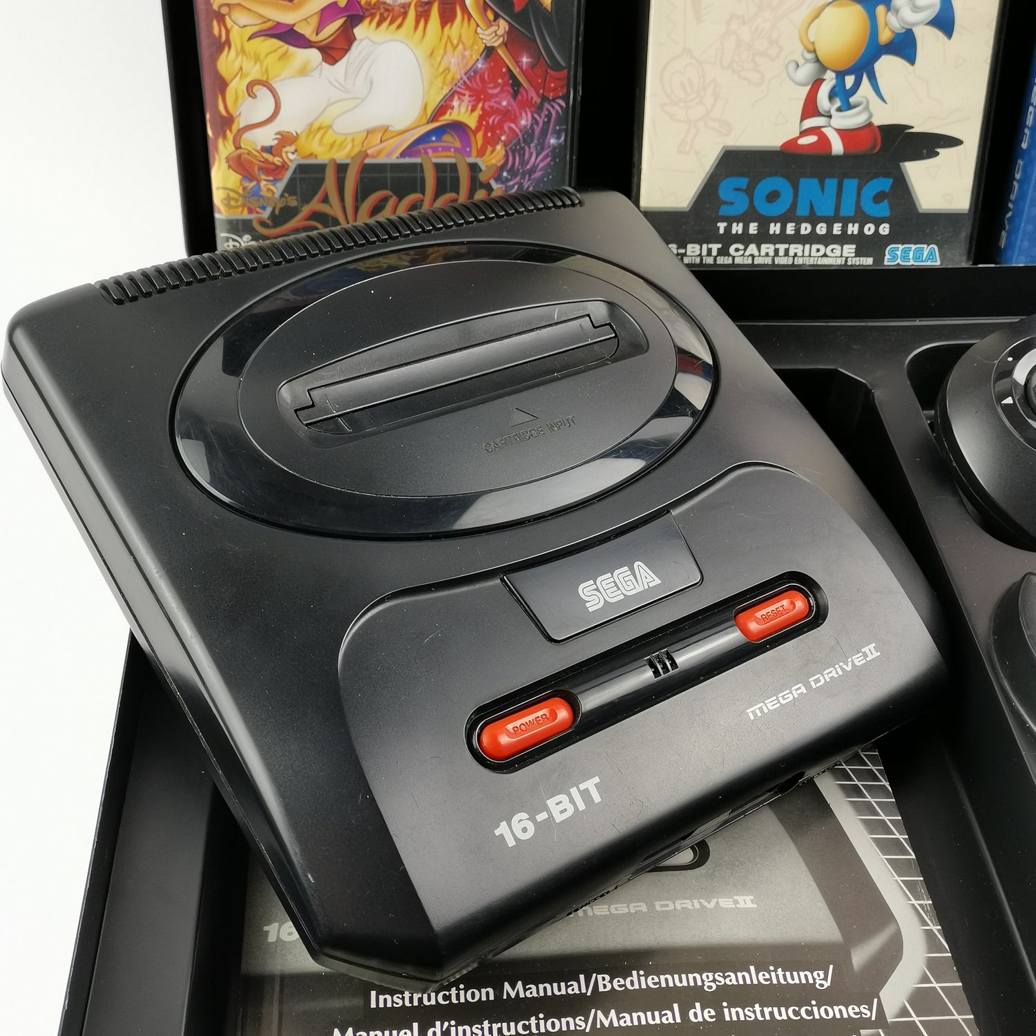 Sega Mega Drive II 2 with 2 controllers, power cable, 4 games and case